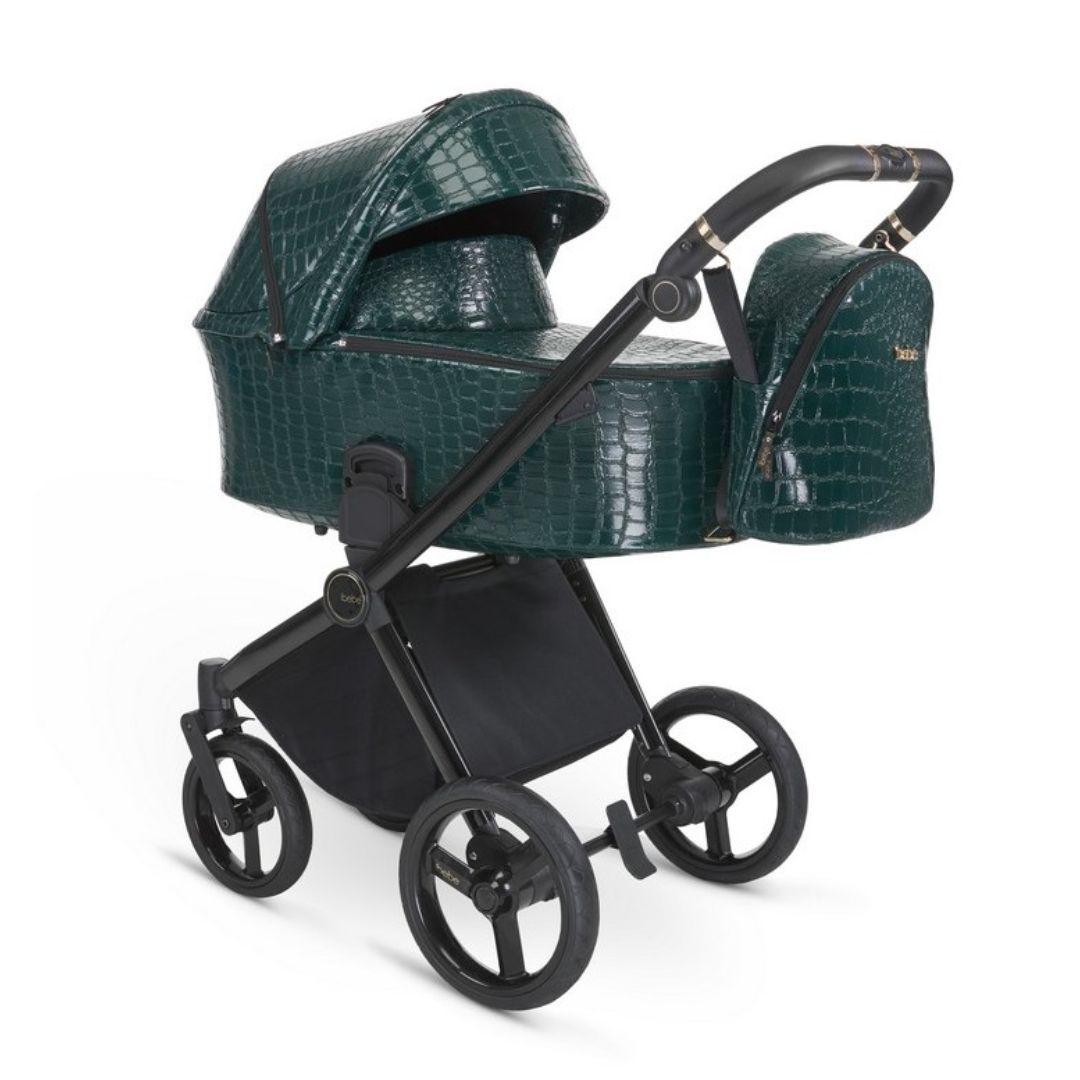 iBebe Gloss eco cocodrilo verde capazo para recién nacido hasta 9kg y silla de paseo hasta 22kg con saco de dormir y mochila comodidad absoluta y funcionalidad diseño cautivador
