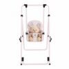Columpio fleur rosa, con asiento decorado con una mariposa y flores en tonos plateados.