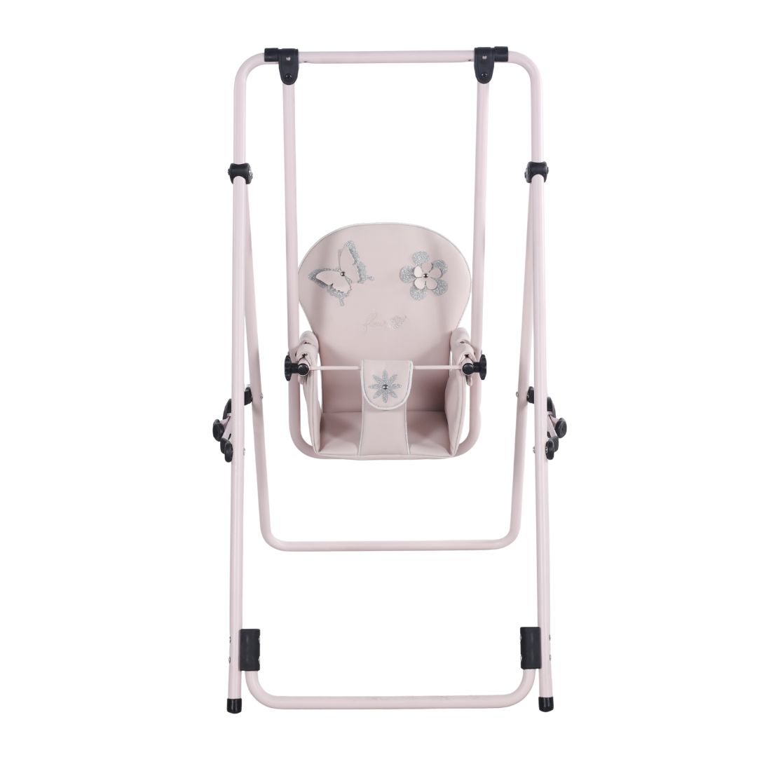 Columpio fleur rosa, con asiento decorado con una mariposa y flores en tonos plateados.
